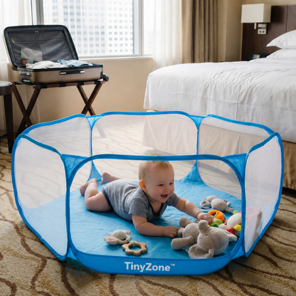 TinyZone™ - De opvouwbare speelplek die je overal mee naartoe neemt.